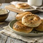 Sourdough bagels and regular bagels comparison with a rustic setup.